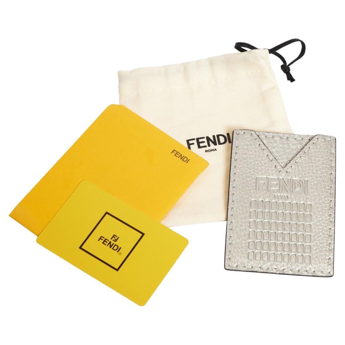 Fendi Silver Embossed Leather Card Holder 90th Anniversary Italy: Fendi Silver Embossed Leather Card Holder 90th Anniversary Italy Celebrate Fendi's legacy with this exquisite silver card holder, crafted from embossed leather. Designed with elegance, this card holde