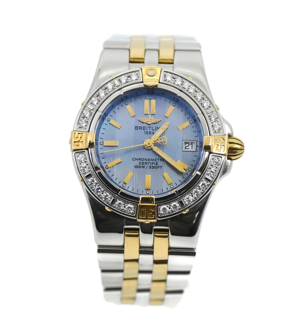 Starliner B71340 Blue Dial Diamond 18K Stainless Quartz Watch With Box and Papers: Starliner B71340 Blue Dial Diamond 18K Stainless Quartz Watch With Box and Papers This Breitling Starliner wristwatch features a 30 mm stainless steel case with diamond bezel accents and an 18K compon