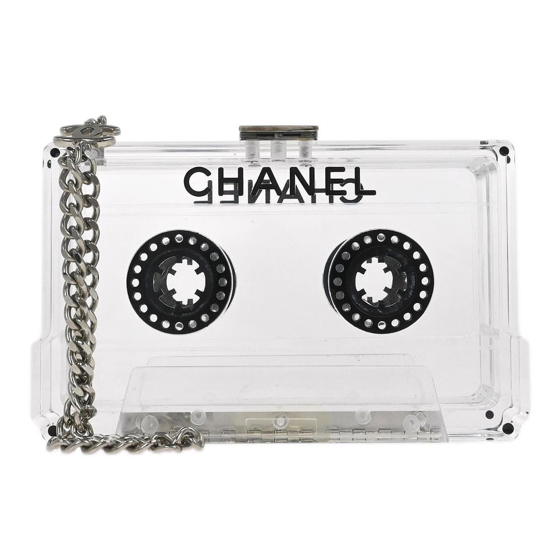 Chanel Mini Clutch Clear Acrylic Cassette Tape Shape Bag 04P: Chanel Mini Clutch Clear Acrylic Cassette Tape Shape Bag 04P This Chanel mini clutch bag features a unique clear acrylic design inspired by a cassette tape. It is equipped with a magnetic closure and