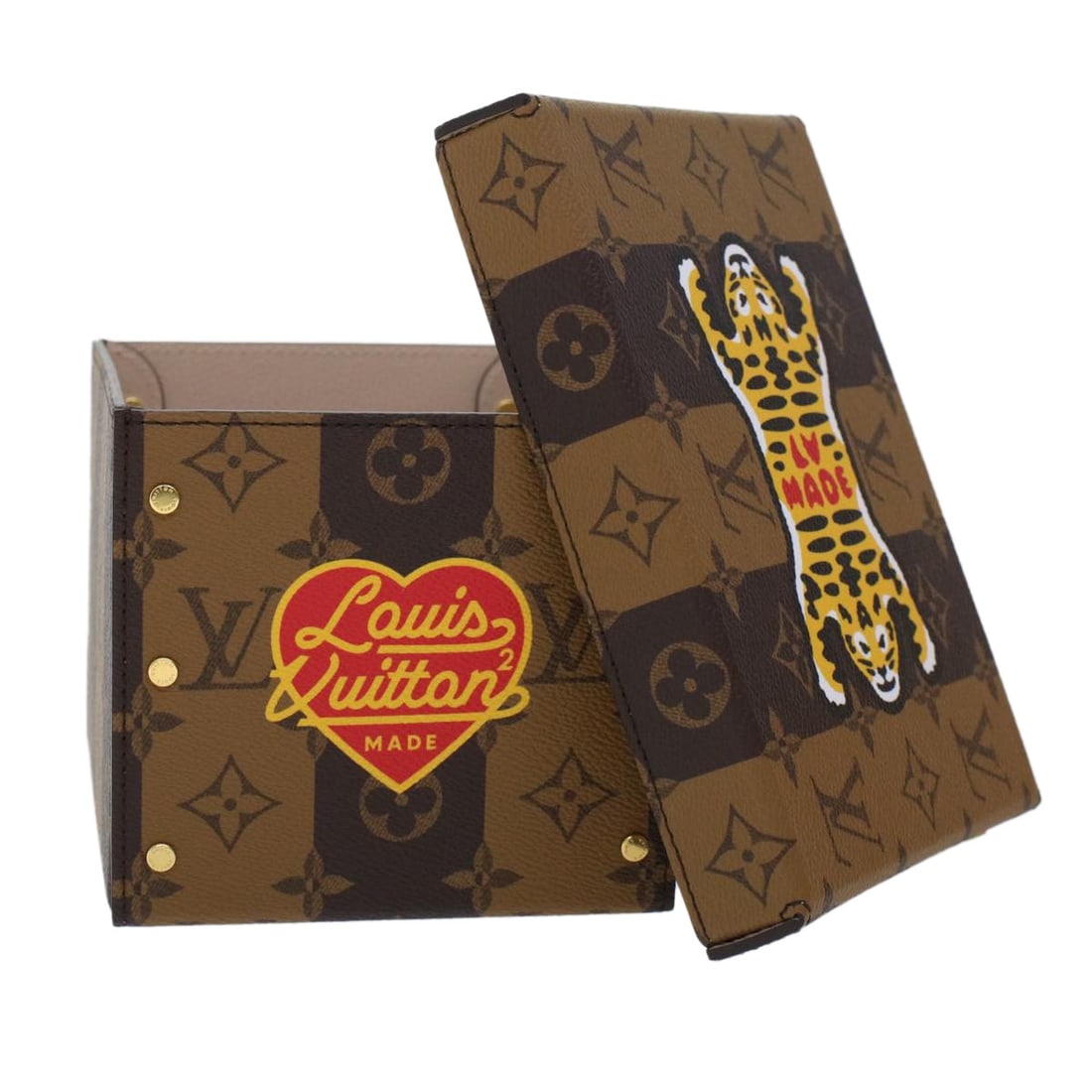 LOUIS VUITTON NIGO Stripe Tiger Accessory Case Monogram Canvas Brown GI0718: LOUIS VUITTON NIGO Stripe Tiger Accessory Case Monogram Canvas Brown GI0718 This exquisite accessory case from Louis Vuitton showcases the iconic monogram canvas in a rich brown color. Crafted in Fran