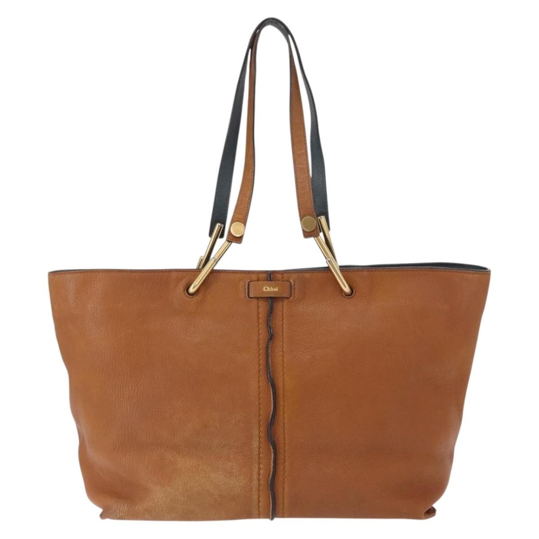 Brown Leather Keri Tote Bag by Chloe 34cm x 27cm x 12cm: Brown Leather Keri Tote Bag by Chloe 34cm x 27cm x 12cm This pre-owned Chloe Keri Tote is crafted from brown leather and designed for women. It features a spacious interior suitable for everyday use.