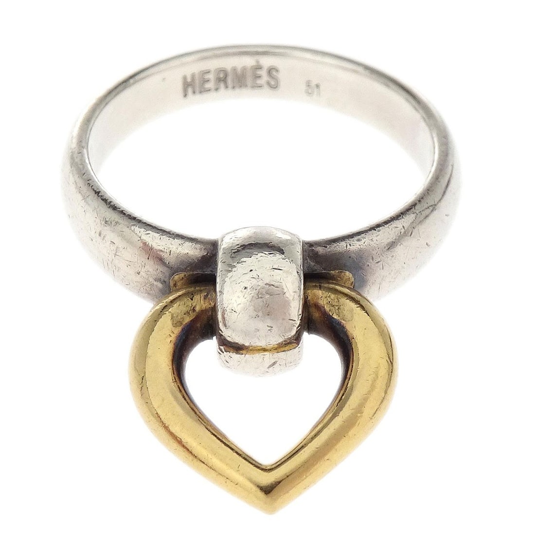 Hermes Knock Heart 18K Silver Ring Size 51 Vintage Jewelry: Hermes Knock Heart 18K Silver Ring Size 51 Vintage Jewelry This vintage Hermes Heart Knock ring features a round shape crafted from SV925 silver and 18K gold. The design does not include a main stone,