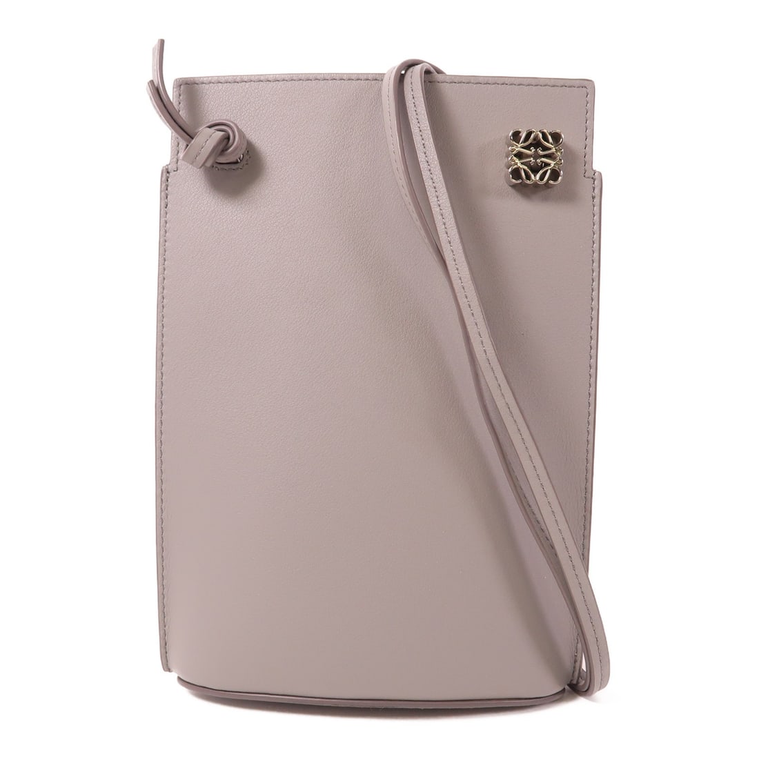 LOEWE Dice Pocket Shoulder Bag Gray Calfskin Leather: LOEWE Dice Pocket Shoulder Bag Gray Calfskin Leather Introducing the LOEWE Dice Pocket Shoulder Bag, a stylish accessory crafted from luxurious gray calfskin leather. This shoulder bag combines functi