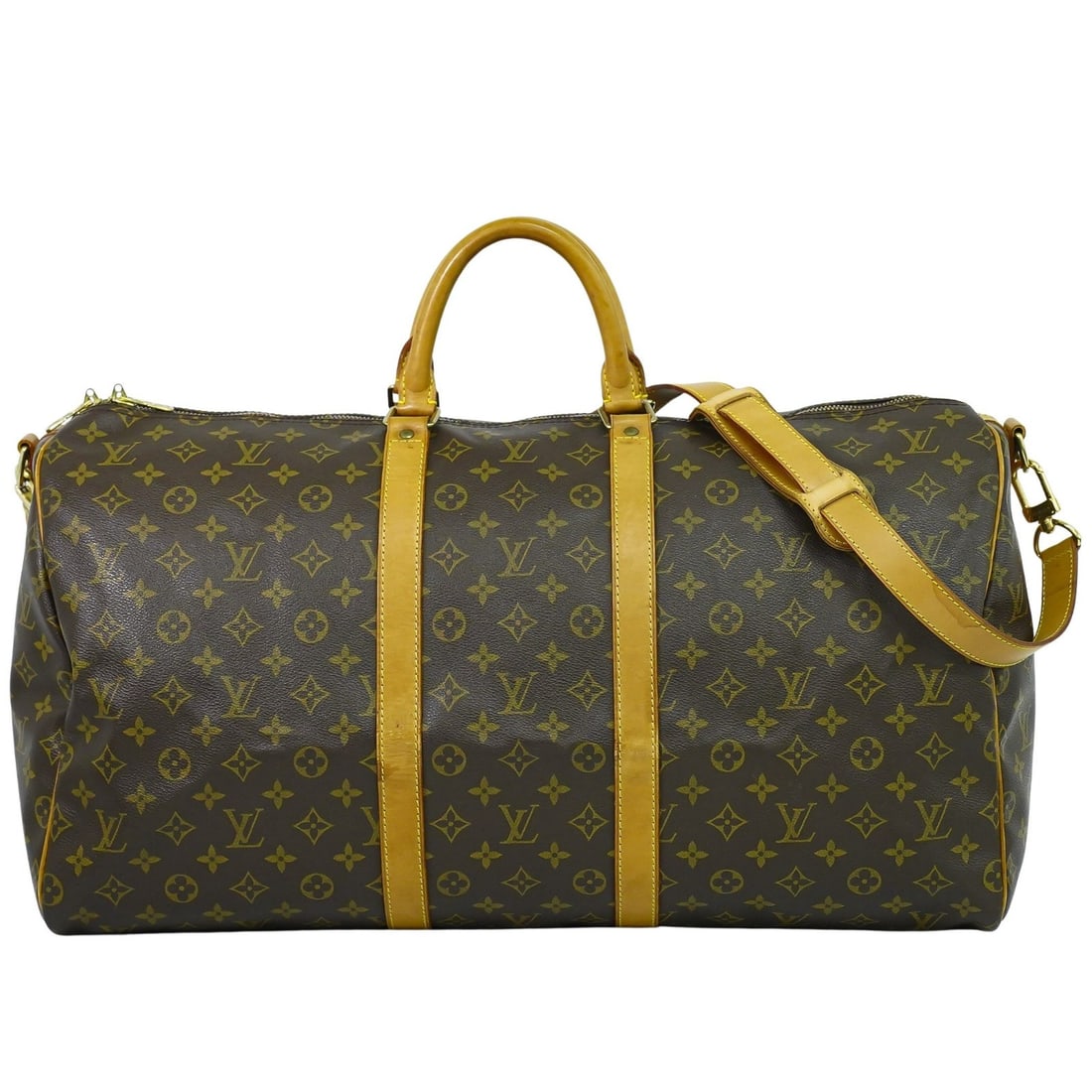 Keepall Bandouliere Monogram Canvas Weekender by Louis Vuitton: Keepall Bandouliere Monogram Canvas Weekender by Louis Vuitton The Louis Vuitton Keepall Bandouliere Bag is crafted from monogram canvas in a classic brown color. Designed for unisex use, this bag fea