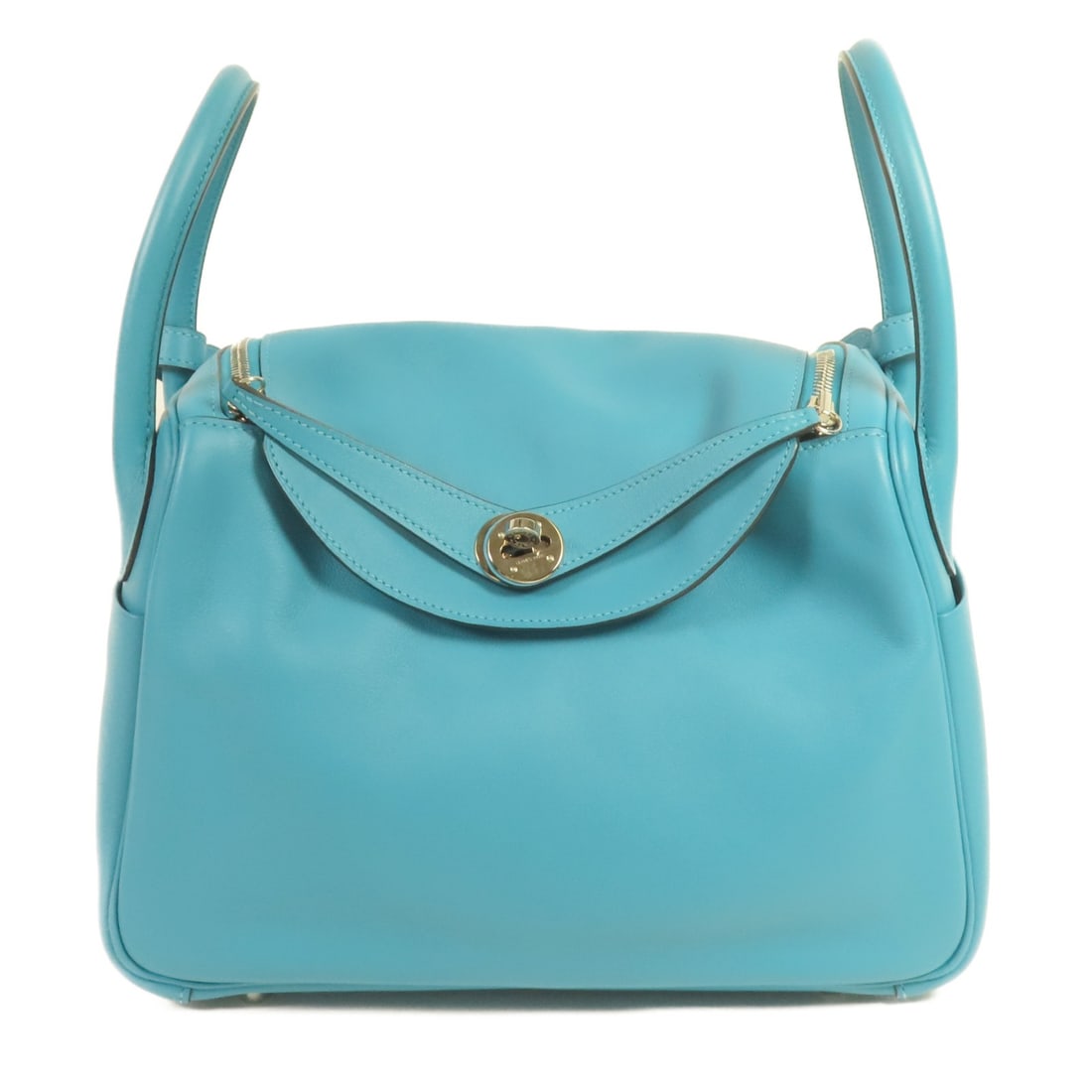 Hermes Lindy 30 Blue Swift Leather Shoulder Bag with Palladium Hardware: Hermes Lindy 30 Blue Swift Leather Shoulder Bag with Palladium Hardware This Hermes Lindy 30 shoulder bag features premium calfskin leather in a vibrant blue color. Designed for regular use, the bag o