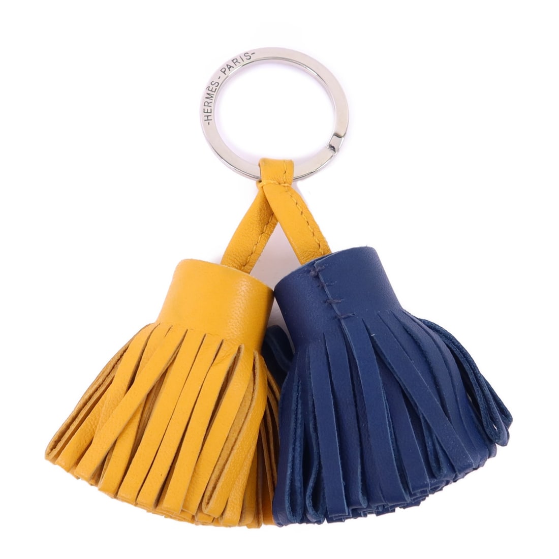 Carmen Duo Navy and Orange Lambskin Key Charm by Hermes: Carmen Duo Navy and Orange Lambskin Key Charm by Hermes Hermes Carmen Duo key ring is crafted from Milo lambskin leather in navy blue and orange. This stylish charm is made in France and features a re