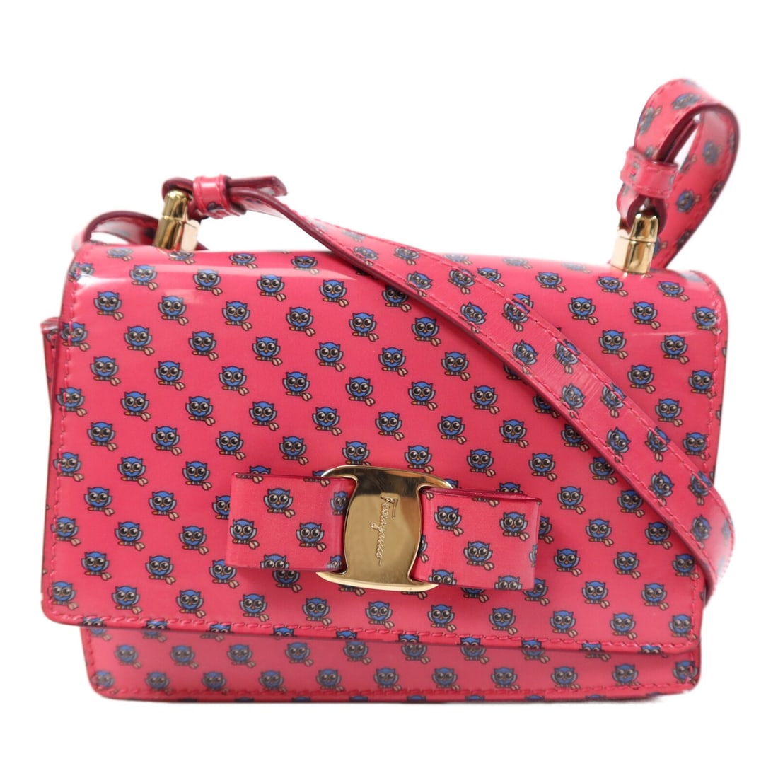 Mini Vara Zoo Pink Coated Canvas Shoulder Bag by Salvatore Ferragamo: Mini Vara Zoo Pink Coated Canvas Shoulder Bag by Salvatore Ferragamo This Salvatore Ferragamo Mini Vara Zoo shoulder bag features a pink PVC coated canvas exterior. Designed in Italy, this compact sho