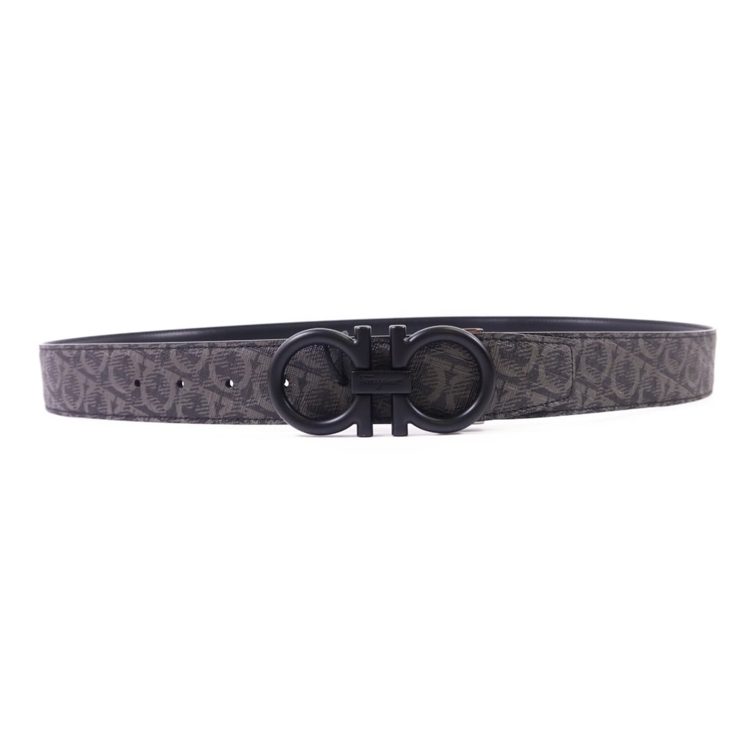 Salvatore Ferragamo Black Gray PVC Coated Canvas Belt: Salvatore Ferragamo Black Gray PVC Coated Canvas Belt Elevate your accessory collection with this stylish Salvatore Ferragamo belt. Crafted from durable PVC coated canvas, this belt features a sleek b