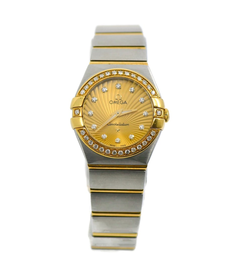 Omega Constellation Diamond 18K Stainless Steel Watch 24mm Box Papers: Omega Constellation Diamond 18K Stainless Steel Watch 24mm Box Papers This exquisite Omega Constellation watch combines elegance and precision, featuring a stunning diamond bezel and a luxurious champ