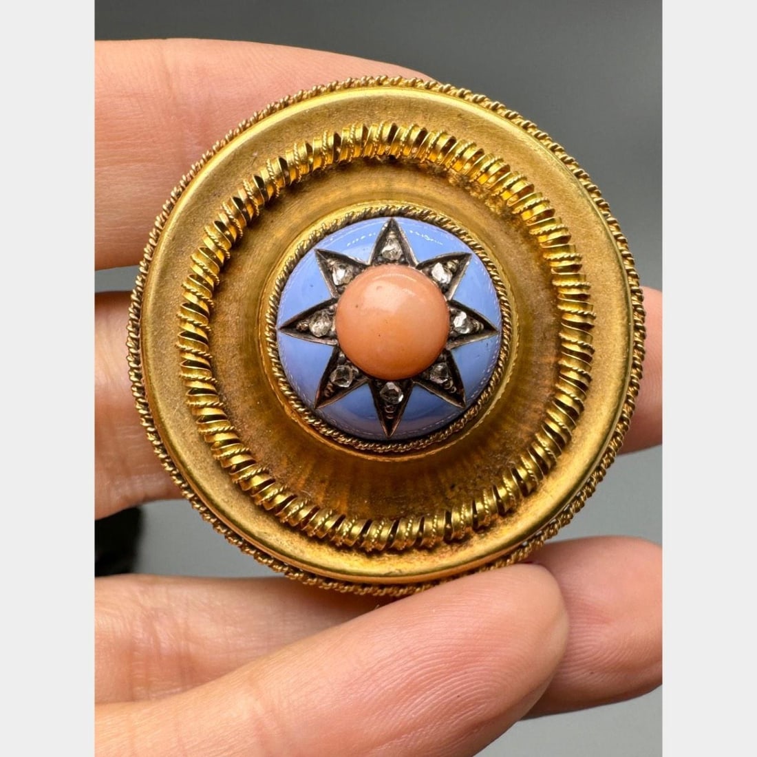 18K Gold Brooch with Coral and Rose Cut Diamonds Victorian Era: 18K Gold Brooch with Coral and Rose Cut Diamonds Victorian Era This Victorian brooch is crafted in 18K yellow gold and features a coral centerpiece accented by eight rose-cut diamonds with an approxim