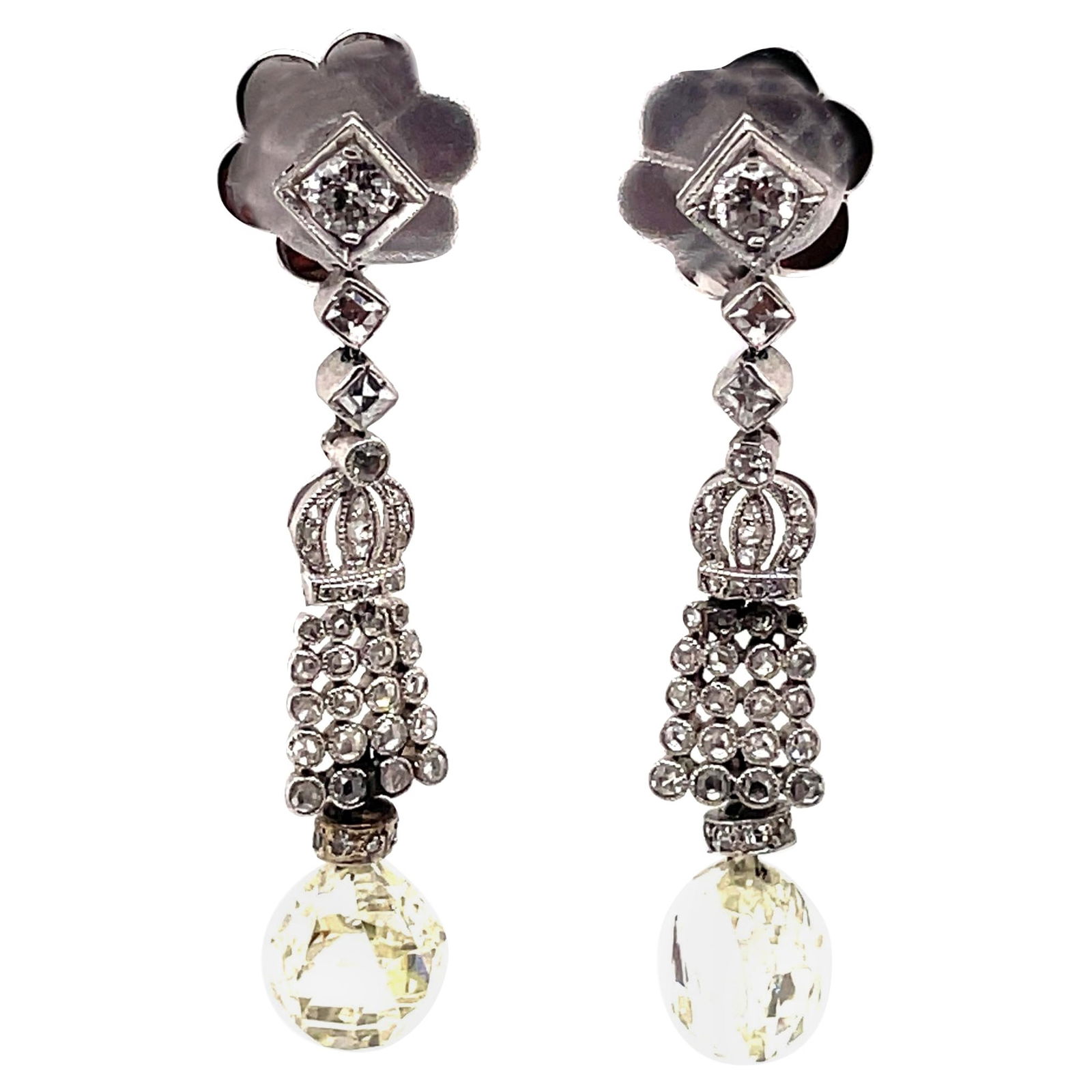 Edwardian Style Diamond Earrings 18k White Gold Briolette Cut: Edwardian Style Diamond Earrings 18k White Gold Briolette Cut These stunning Edwardian Style Briolette Diamond Earrings are crafted from 18k white gold, showcasing a captivating crown motif. Each earr