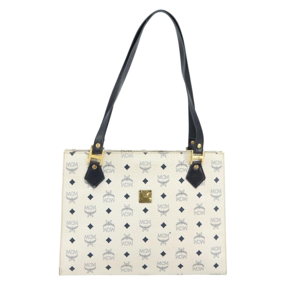 MCM Leather Vintage Visetos White Tote Bag 34cm by 25cm by 9cm: MCM Leather Vintage Visetos White Tote Bag 34cm by 25cm by 9cm This MCM Vintage Visetos tote bag for women features a leather construction in white. The bag measures 34cm x 25cm x 9cm and is made in G