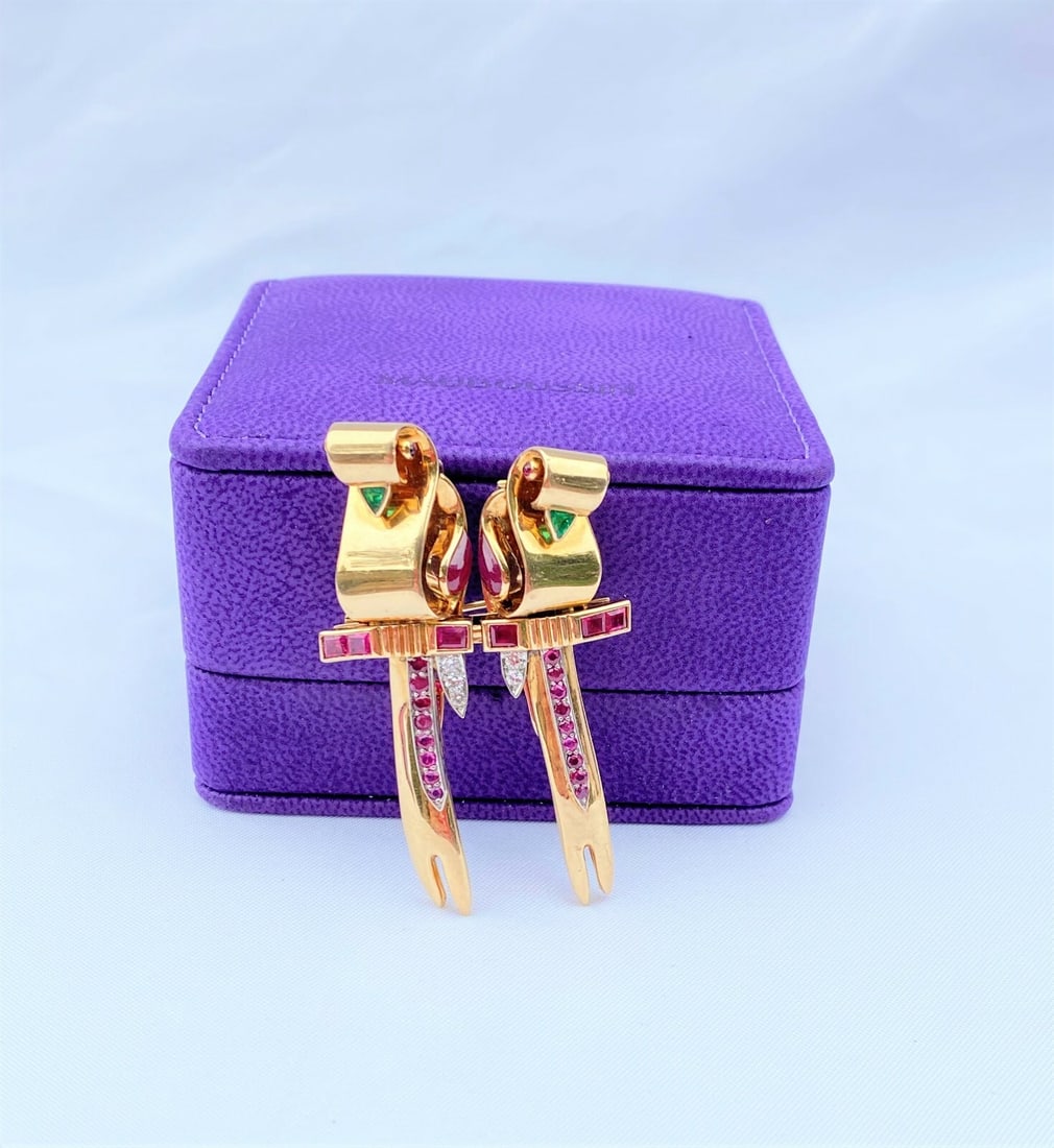 1950s Mauboussin 18K Gold Diamond Ruby Emerald Bird Brooch with Box: 1950s Mauboussin 18K Gold Diamond Ruby Emerald Bird Brooch with Box Discover the elegance of this stunning 1950's Mauboussin brooch, crafted in 18K yellow gold and adorned with exquisite diamonds, rub