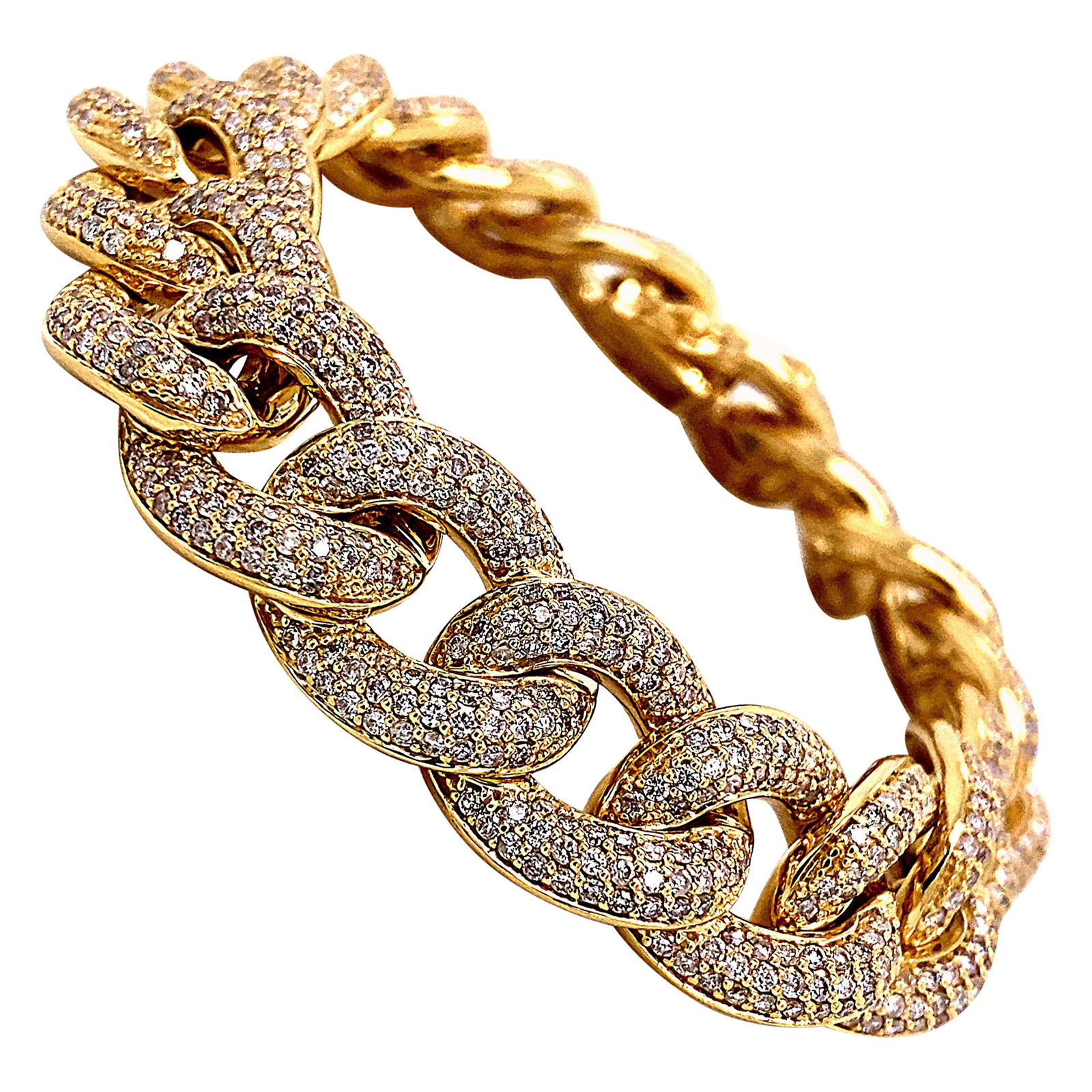 6.93 Carat Diamond Cuban Link Bracelet in 14k Yellow Gold: 6.93 Carat Diamond Cuban Link Bracelet in 14k Yellow Gold This stunning 6.93 Carat Diamond Cuban Link Bracelet is crafted from 14k yellow gold and features a contemporary design. The bracelet showcase