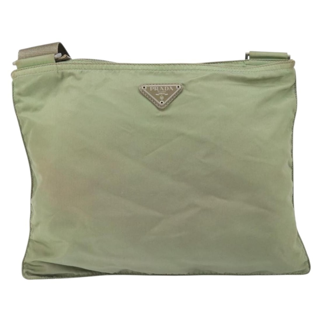 Green Nylon Unisex Messenger Bag by Prada 30cm x 24cm x 30cm: Green Nylon Unisex Messenger Bag by Prada 30cm x 24cm x 30cm This Prada Flat Messenger Bag is crafted from green nylon and designed for unisex use. Featuring a spacious structure, the bag shows signs