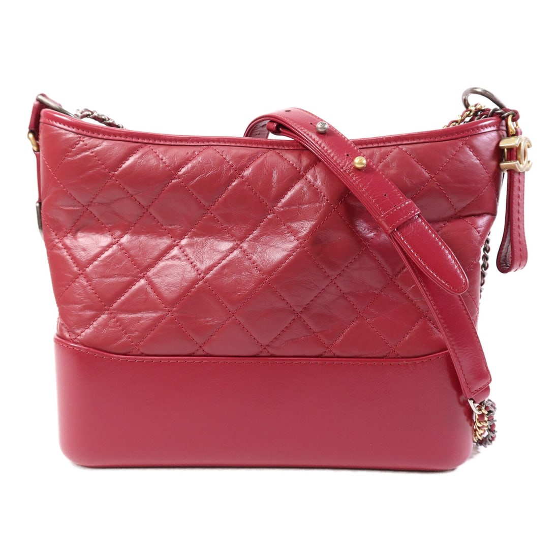 Red Calfskin CHANEL Gabrielle Medium Shoulder Bag with Chain: Red Calfskin CHANEL Gabrielle Medium Shoulder Bag with Chain This CHANEL CC Gabrielle Medium Chain Shoulder Bag features a luxurious calfskin leather exterior in red. Designed as a shoulder bag, it of