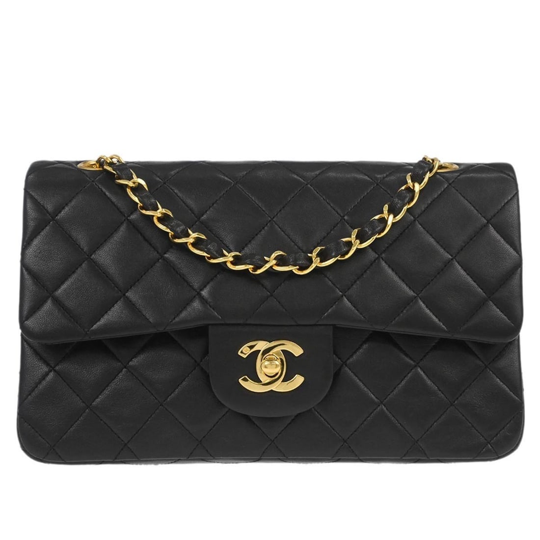 Small Classic Double Flap Black Leather Shoulder Bag by Chanel: Small Classic Double Flap Black Leather Shoulder Bag by Chanel This Chanel Classic Double Flap Small shoulder bag is crafted from black lambskin leather with a matelasse pattern. It features a flap tu