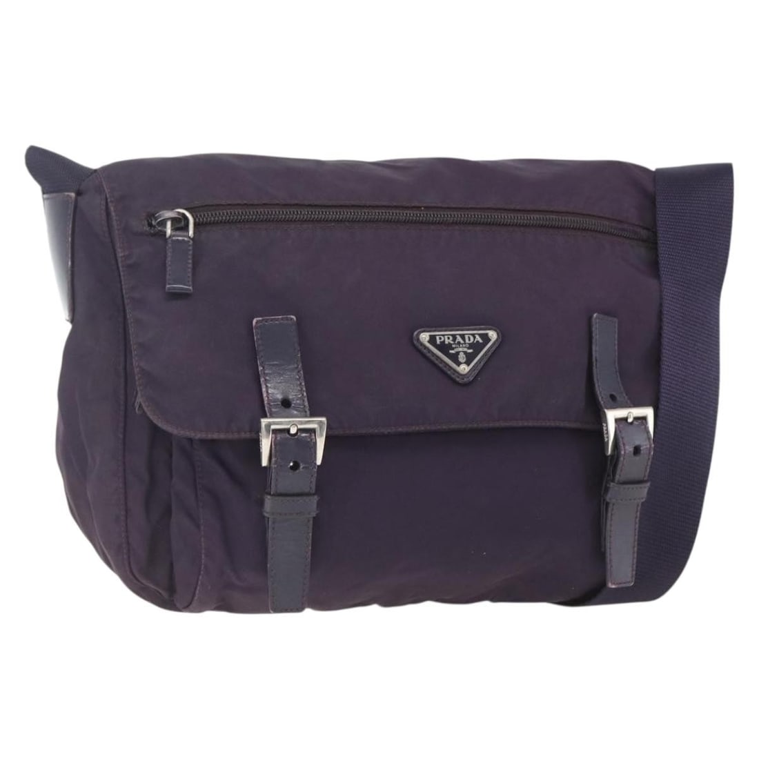 Purple Nylon Prada Messenger Bag Double Buckle Flap 29cm by 20cm by 11cm: Purple Nylon Prada Messenger Bag Double Buckle Flap 29cm by 20cm by 11cm This Prada Double Buckle Flap Messenger Bag in purple nylon is designed for unisex use. It features a flap with double buckle c