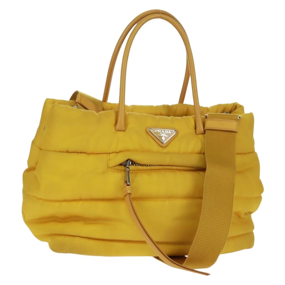 Prada Yellow Nylon Bomber Style 2way Handbag with Silver Accents and Strap: Prada Yellow Nylon Bomber Style 2way Handbag with Silver Accents and Strap This PRADA Test Bomber handbag offers versatile 2-way styling and is crafted from durable nylon in an eye-catching yellow and