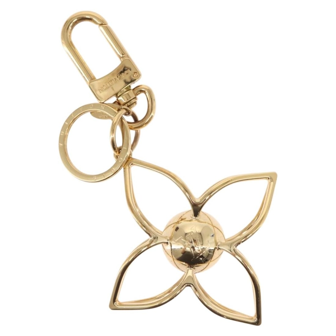 Louis Vuitton Gold Metal Sphere Key Holder M61024 with Dust Bag: Louis Vuitton Gold Metal Sphere Key Holder M61024 with Dust Bag This authentic Louis Vuitton LV Sphere Key Holder is a stylish accessory crafted from high-quality metal in a striking gold finish. Meas