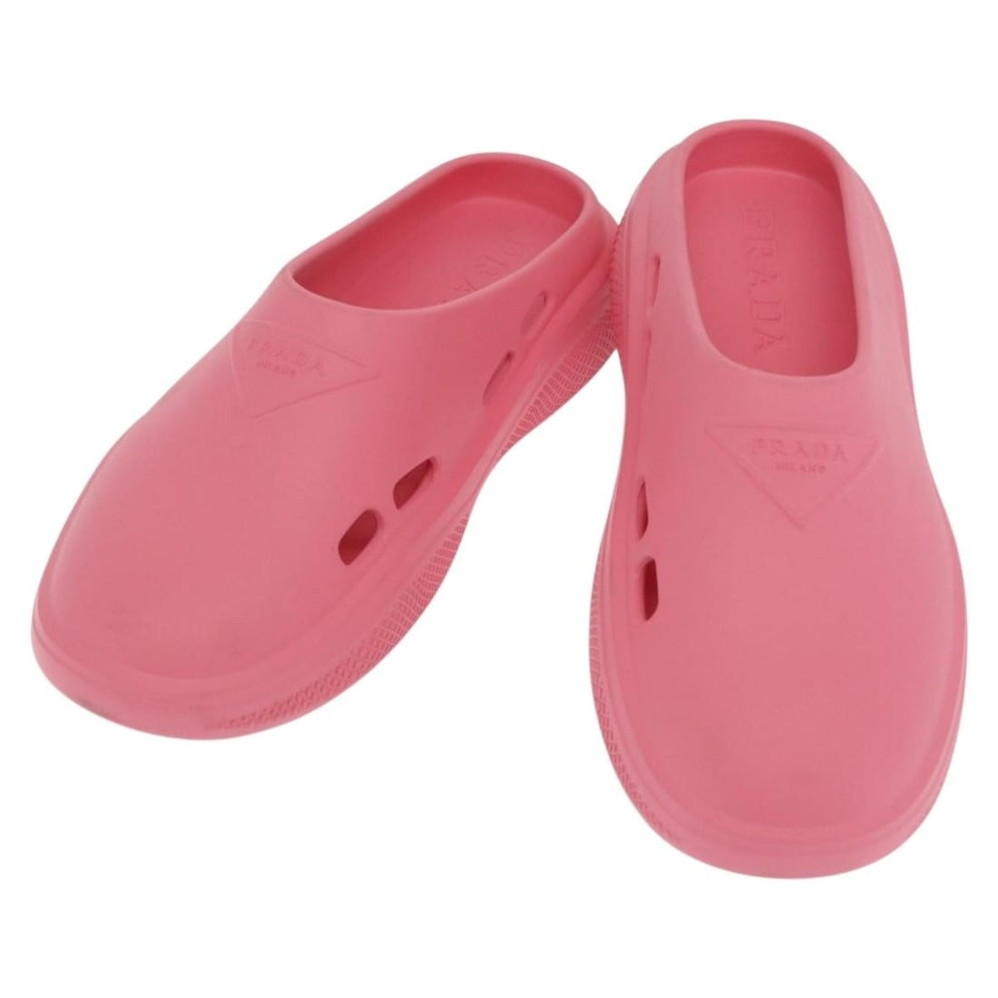 Pink Rubber Slide Sandals by PRADA Size 11 with Box: Pink Rubber Slide Sandals by PRADA Size 11 with Box These PRADA slide sandals feature a stylish pink rubber upper and are designed for women. Crafted in Italy, they offer a comfortable fit with a tota