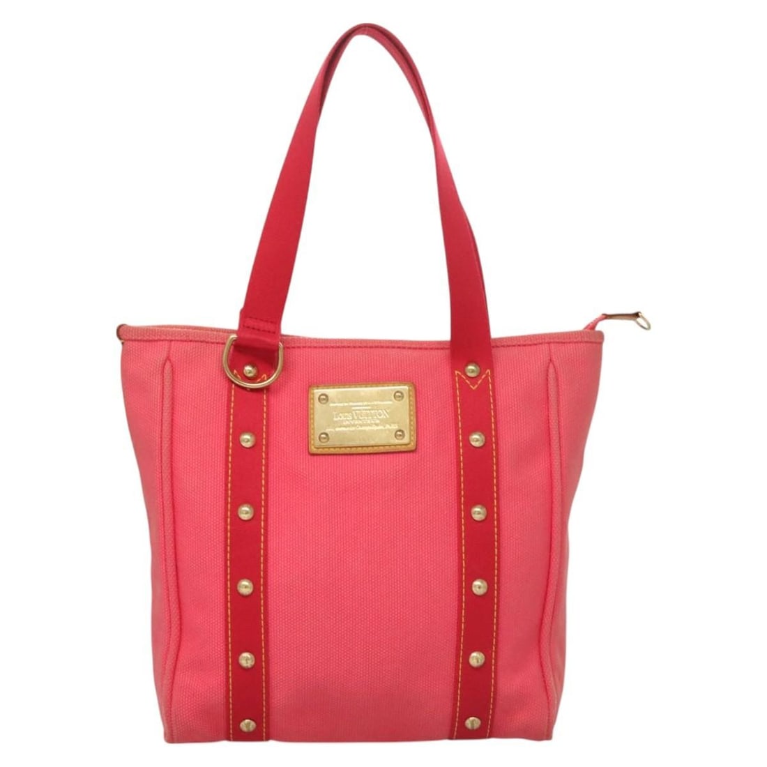 Pink Canvas Louis Vuitton Antigua Tote Bag 28cm x 29cm x 9cm: Pink Canvas Louis Vuitton Antigua Tote Bag 28cm x 29cm x 9cm This Louis Vuitton Antigua Tote is crafted from pink canvas and designed for women. The bag features an open-top design with sturdy handles