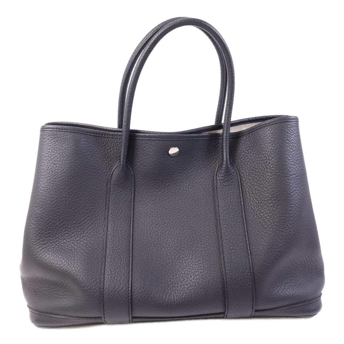 Hermes Garden Party PM Black Calfskin Tote with Palladium Hardware: Hermes Garden Party PM Black Calfskin Tote with Palladium Hardware This Hermes Garden Party PM handbag is crafted from Negonda leather in a plomb (black) color. Featuring palladium-plated hardware and