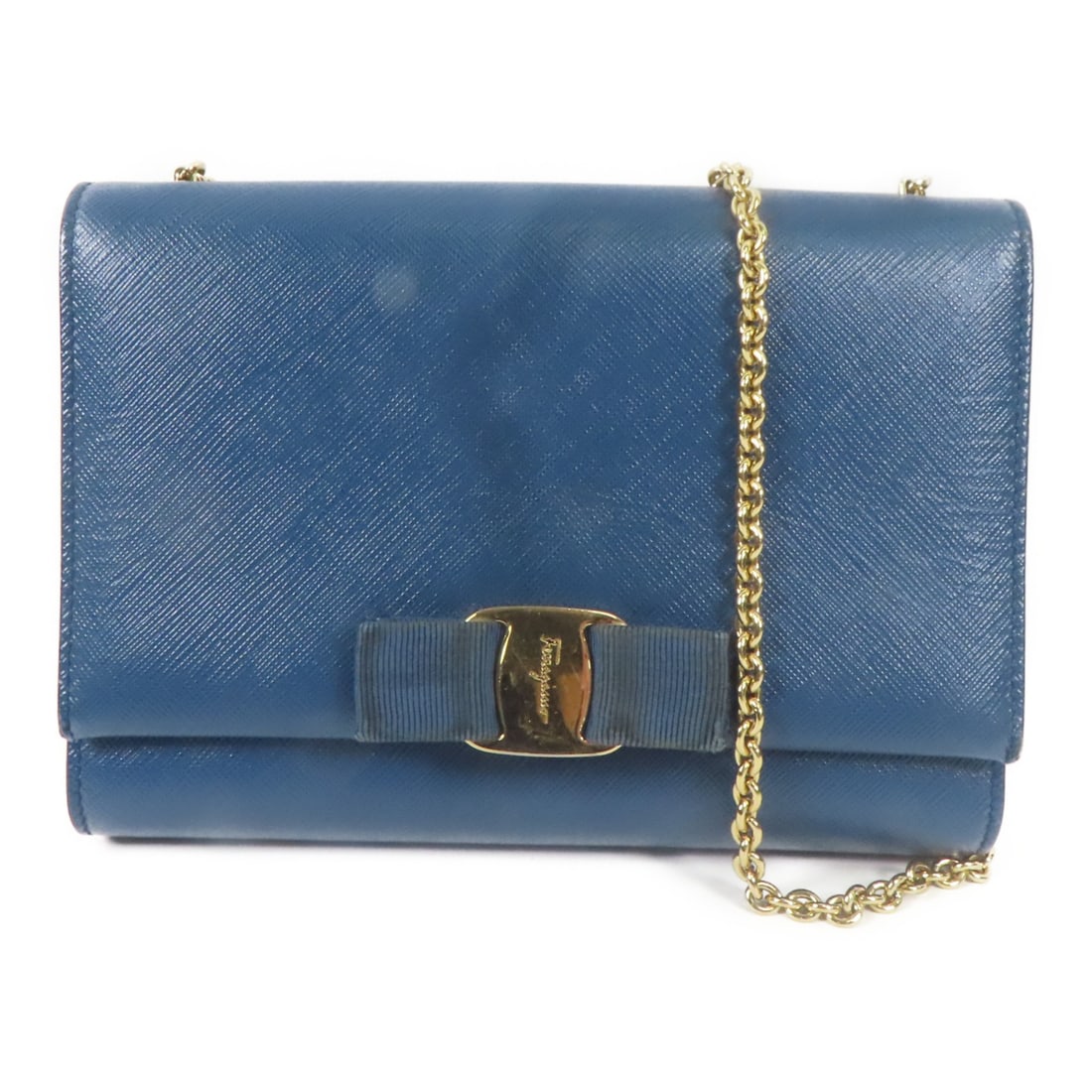 Salvatore Ferragamo Blue Calfskin Shoulder Bag with Chain Strap: Salvatore Ferragamo Blue Calfskin Shoulder Bag with Chain Strap This stylish Salvatore Ferragamo shoulder bag is crafted from high-quality calfskin leather in a striking blue hue. With a sleek design,