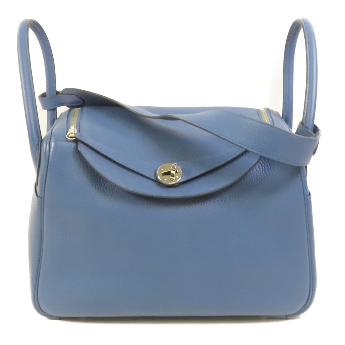 Blue Clemence Leather Lindy 30 Shoulder Bag by Hermes with Palladium Hardware: Blue Clemence Leather Lindy 30 Shoulder Bag by Hermes with Palladium Hardware This Hermes Lindy 30 is a versatile 2-way shoulder and hand bag crafted from Clemence calfskin leather in blue. It feature