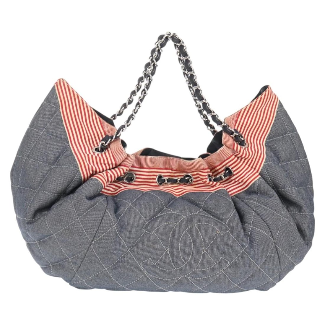 Blue Denim Tote Bag Chanel Stretch Spirit Cabas: Blue Denim Tote Bag Chanel Stretch Spirit Cabas The Chanel Stretch Spirit Cabas is a stylish tote crafted from blue denim, designed for women. This pre-owned bag is in excellent condition with minimal