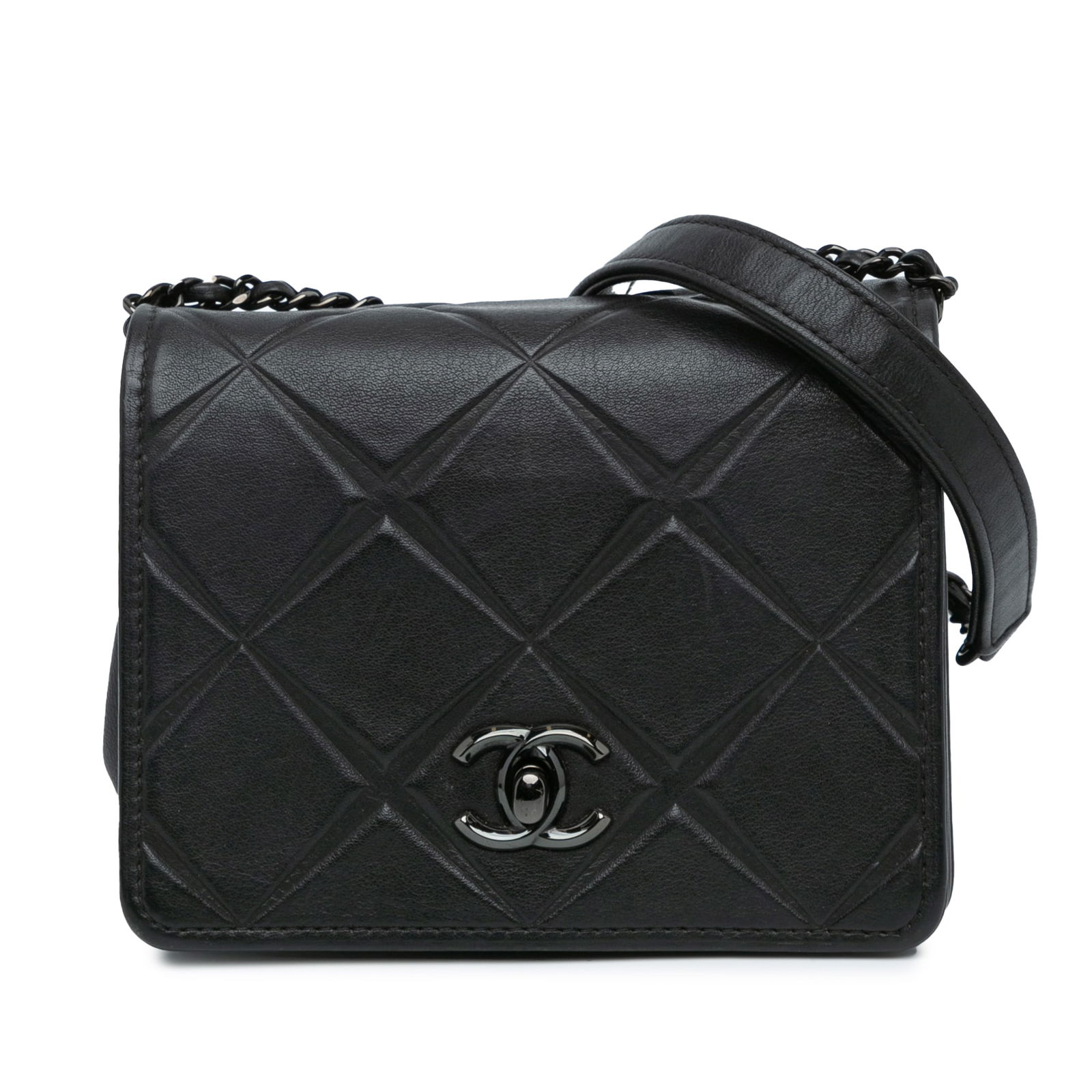 Chanel Mini Calfskin Propeller Flap Black Leather Bag: Chanel Mini Calfskin Propeller Flap Black Leather Bag Introducing the Chanel Mini Calfskin Propeller Flap, a sophisticated accessory crafted from luxurious quilted calf leather in a timeless black col