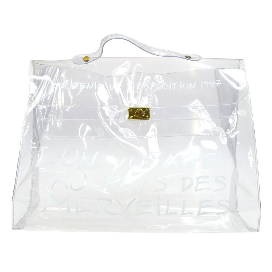 Clear Plastic Kelly Souvenir Bag by Hermes France: Clear Plastic Kelly Souvenir Bag by Hermes France This Hermes Kelly Souvenir Bag is crafted from clear plastic and designed for women. The bag features a spacious interior and is accented with hardwar