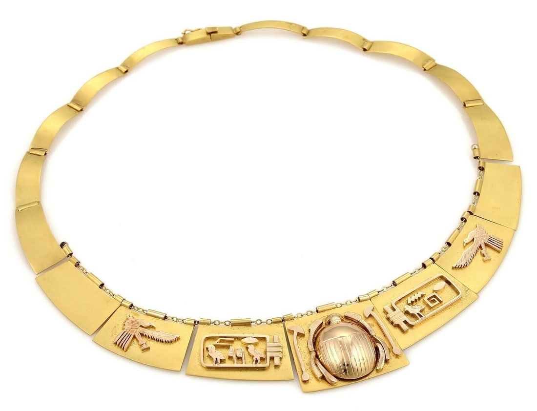 Egyptian Scarab Hieroglyph 18k and 14k Gold Vintage Graduated Panel Necklace: Egyptian Scarab Hieroglyph 18k and 14k Gold Vintage Graduated Panel Necklace This vintage Egyptian graduated panel necklace is crafted from 18k yellow gold for the main structure and 14k rose gold for