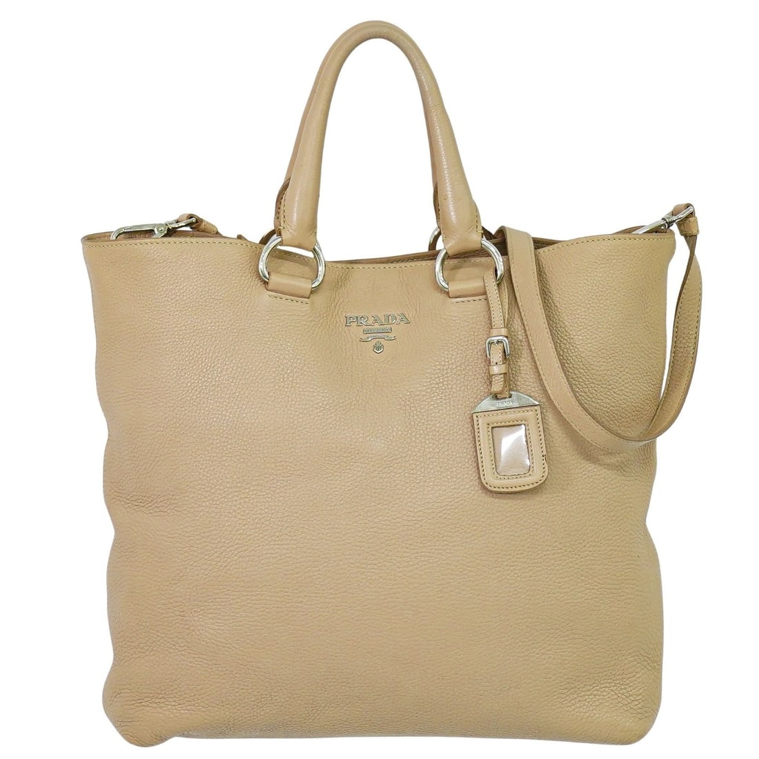 Beige Leather Prada Tote Bag Vitello Daino 35cm Women: Beige Leather Prada Tote Bag Vitello Daino 35cm Women This pre-owned Prada Shopping Tote in beige Vitello Daino leather features a spacious design suitable for everyday use. Crafted in Italy for women