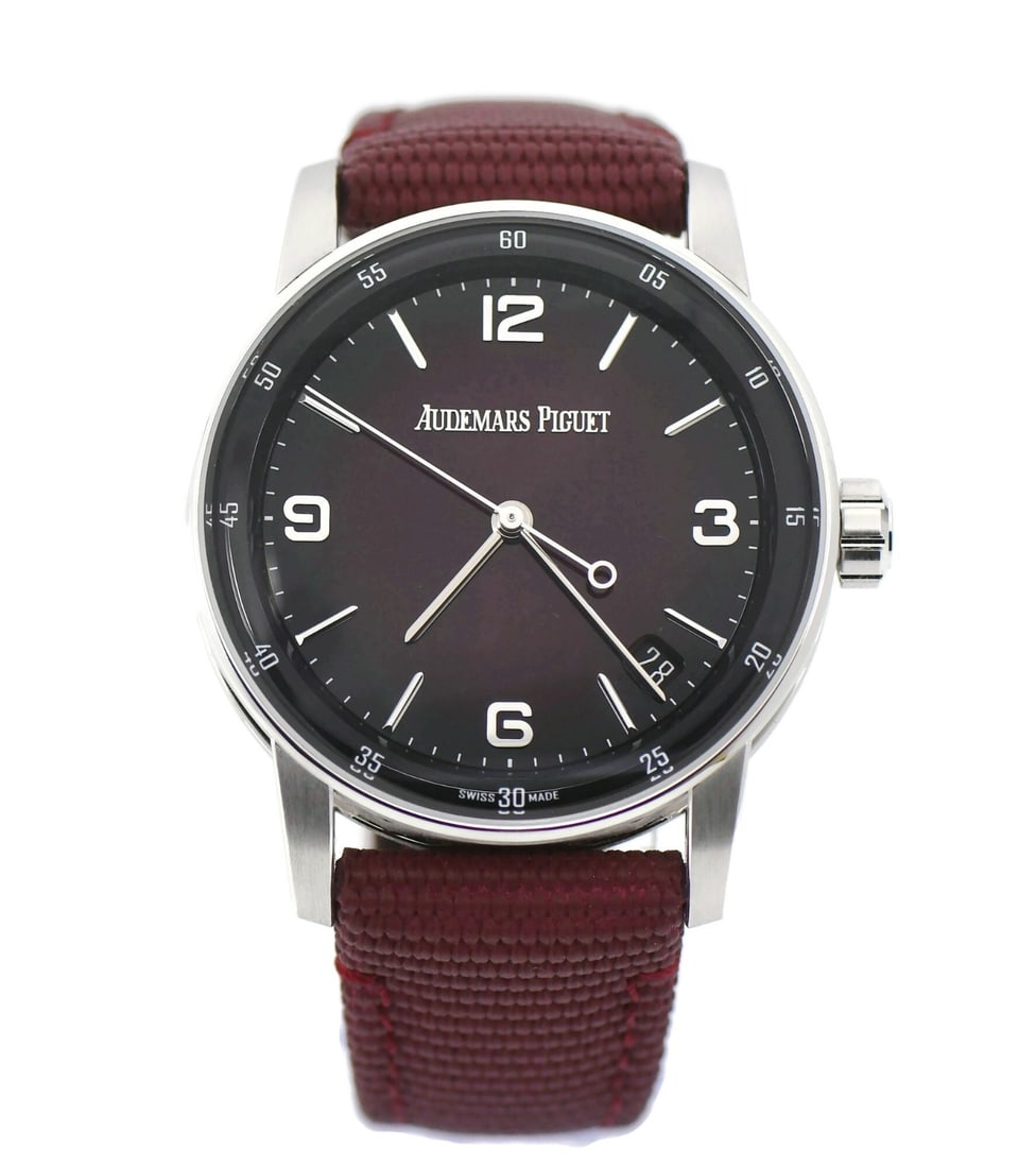 Code 11.59 Red Dial 18K White Gold Automatic Wristwatch Ref 15210BC: Code 11.59 Red Dial 18K White Gold Automatic Wristwatch Ref 15210BC This Audemars Piguet Code 11.59 wristwatch features a 41 mm case crafted from 18K white gold. The watch has a striking red analog di