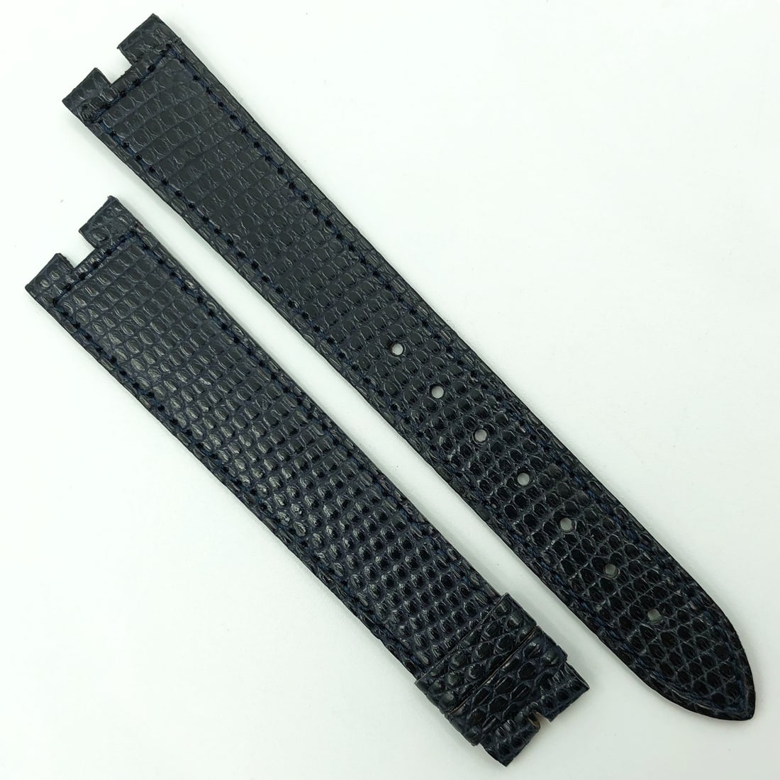 Cartier Authentic Dark Blue Leather Strap 16.5mm for Buckle: Cartier Authentic Dark Blue Leather Strap 16.5mm for Buckle Enhance your timepiece with this authentic Cartier 16.5mm dark blue leather strap designed for a buckle. This pre-owned wristwatch band feat