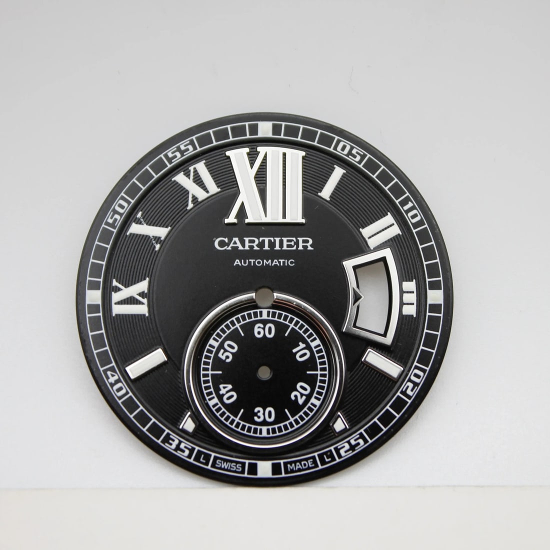 Cartier Calibre Black Dial MX006W50 for W7100016 W7100041 Models: Cartier Calibre Black Dial MX006W50 for W7100016 W7100041 Models Enhance your Cartier watch with this luxurious black dial, compatible with the Cartier Calibre MX006W50 models W7100016 and W7100041. F