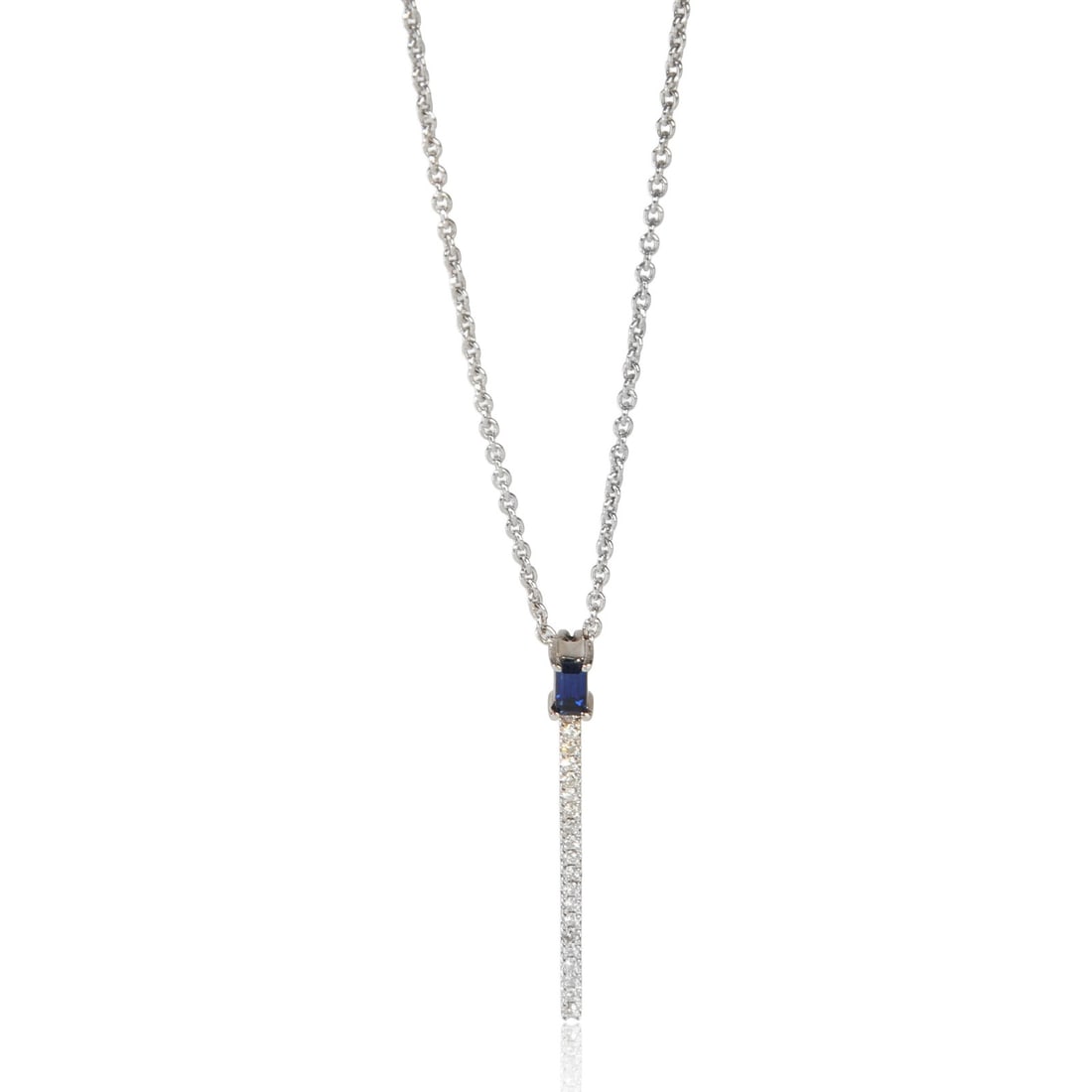 Stick Pendant in 14K White Gold with Sapphire and Diamonds: Stick Pendant in 14K White Gold with Sapphire and Diamonds This elegant stick pendant features a 14K white gold setting adorned with a baguette-shaped white sapphire as the main stone and round brilli
