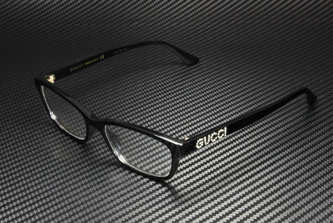 Gucci GG0730O 005 Black Rectangle Eyeglasses with Demo Lens: Gucci GG0730O 005 Black Rectangle Eyeglasses with Demo Lens Discover the elegance of GUCCI GG0730O 005 eyeglasses, designed for women with a stylish rectangular frame in classic black. Crafted in Ital