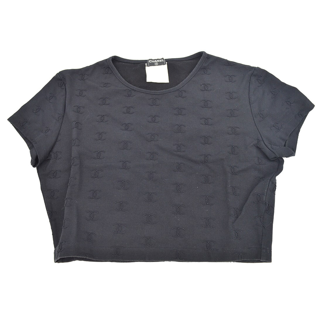 Chanel Black Short Sleeve Round Neck T-Shirt Logo Accents: Chanel Black Short Sleeve Round Neck T-Shirt Logo Accents Elevate your casual wardrobe with this chic Chanel Round Neck Short Sleeve Top. Designed for a regular fit, this black t-shirt features a clas