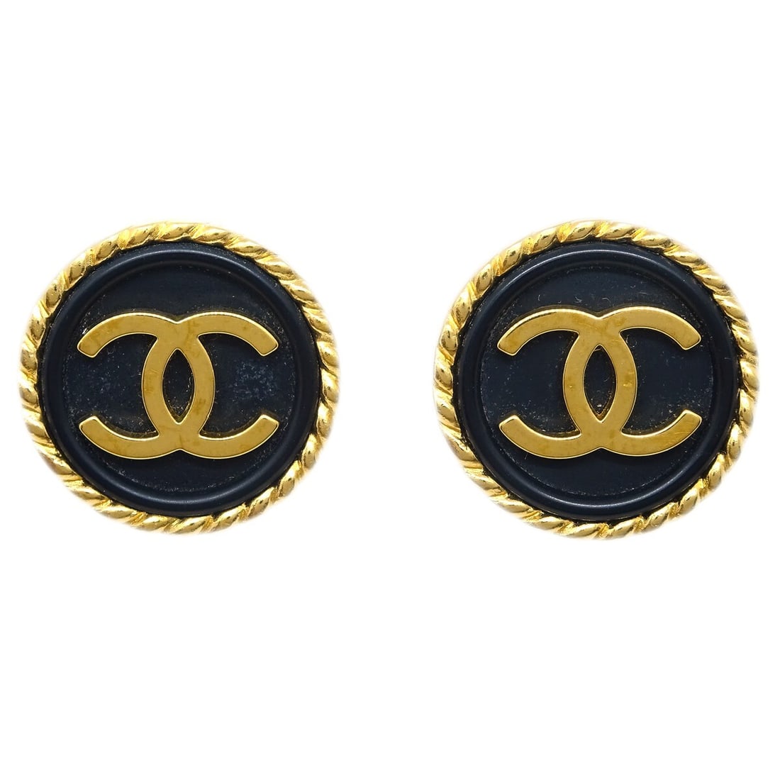 Chanel Black Gold-Plated Button Clip-On Earrings 97A: Chanel Black Gold-Plated Button Clip-On Earrings 97A These elegant Chanel black button earrings are a stunning accessory that combines style and sophistication. Featuring a round shape, these clip-on