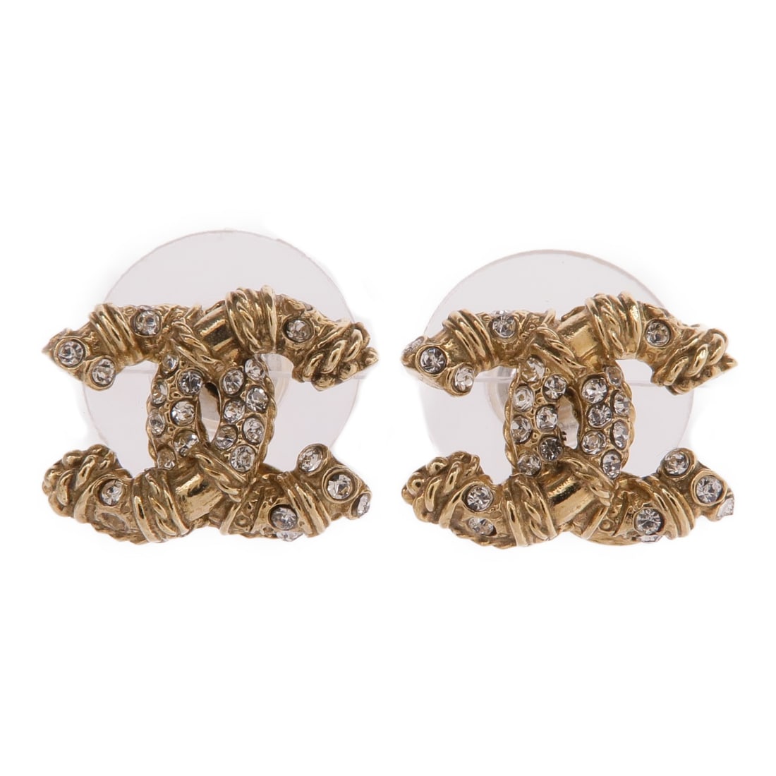 Pierced Gold Tone Earrings with CC Logo by CHANEL: Pierced Gold Tone Earrings with CC Logo by CHANEL These CHANEL CC earrings feature a classic pierced design crafted in gold-tone metal. The earrings are made in France and showcase the iconic CHANEL l