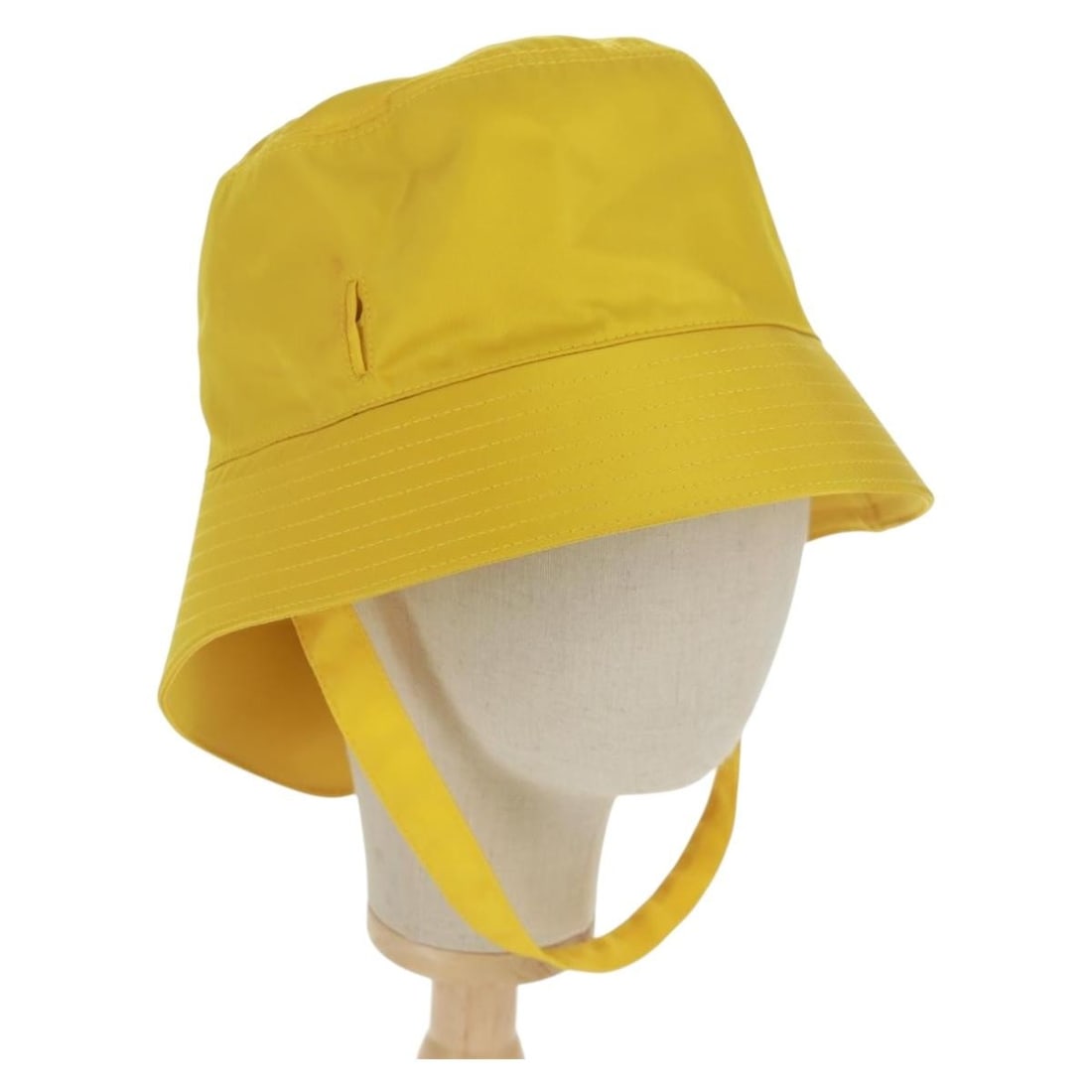 Yellow Nylon Hat by Prada Made in Italy: Yellow Nylon Hat by Prada Made in Italy This PRADA hat is crafted from yellow nylon and features a classic design. Made in Italy, it has a head circumference of approximately 61 cm (24.0 inches). The