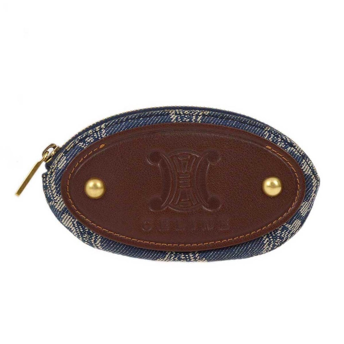 Blue Denim Macadam Pattern Coin Wallet by Celine: Blue Denim Macadam Pattern Coin Wallet by Celine This Celine coin wallet features the iconic Macadam pattern in blue denim. Accented with the Celine logo, it is designed as a compact coin purse. The w