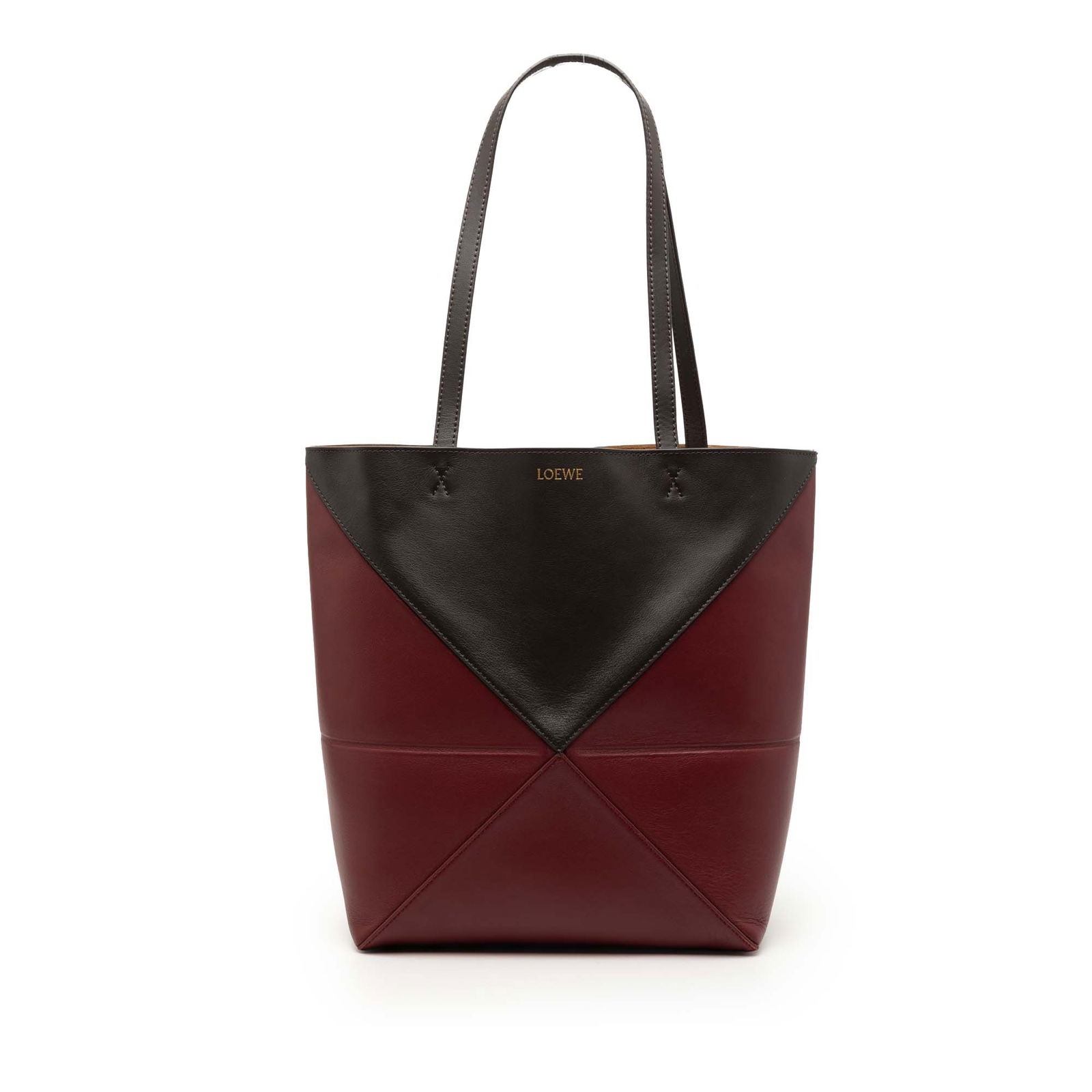 LOEWE Puzzle Fold Medium Tote in Red Bicolor Shiny Calfskin Leather: LOEWE Puzzle Fold Medium Tote in Red Bicolor Shiny Calfskin Leather This LOEWE Medium Bicolor Shiny Calfskin Puzzle Fold Tote features a leather body with flat leather straps and an open top. The bag