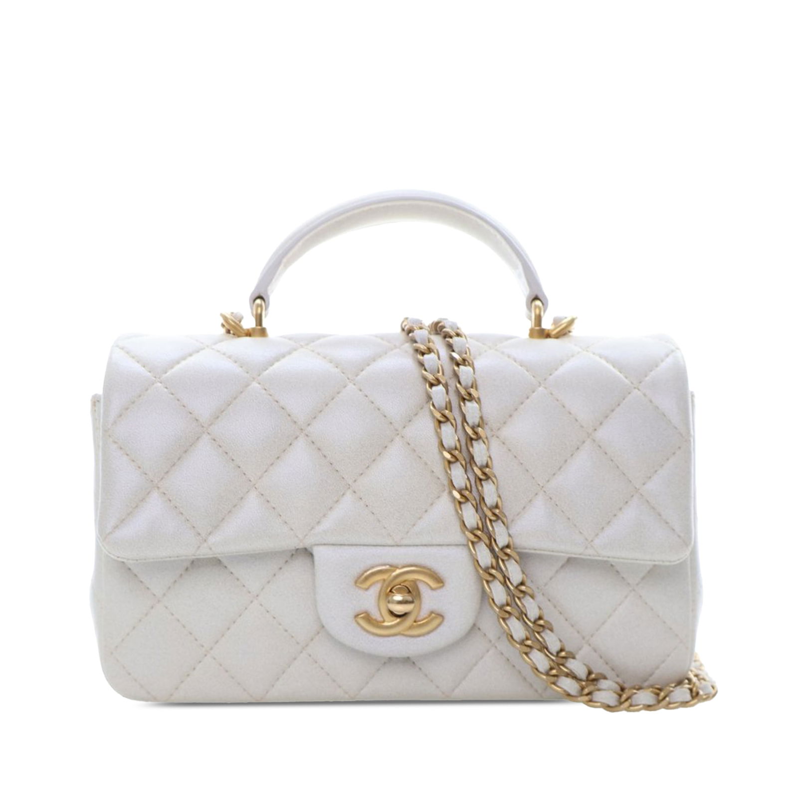 White Iridescent Lambskin Mini Top Handle Flap Bag by Chanel: White Iridescent Lambskin Mini Top Handle Flap Bag by Chanel This Chanel Mini Rectangular Top Handle Flap bag features a quilted iridescent lambskin leather body with a flat leather top handle and a l