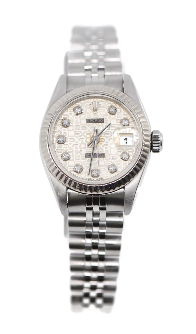 Rolex Datejust 79174 Diamond Stainless Steel Watch with Papers: Rolex Datejust 79174 Diamond Stainless Steel Watch with Papers This exquisite Rolex Datejust watch features a stunning diamond bezel set in a robust stainless steel case, measuring 26 mm. The silver d