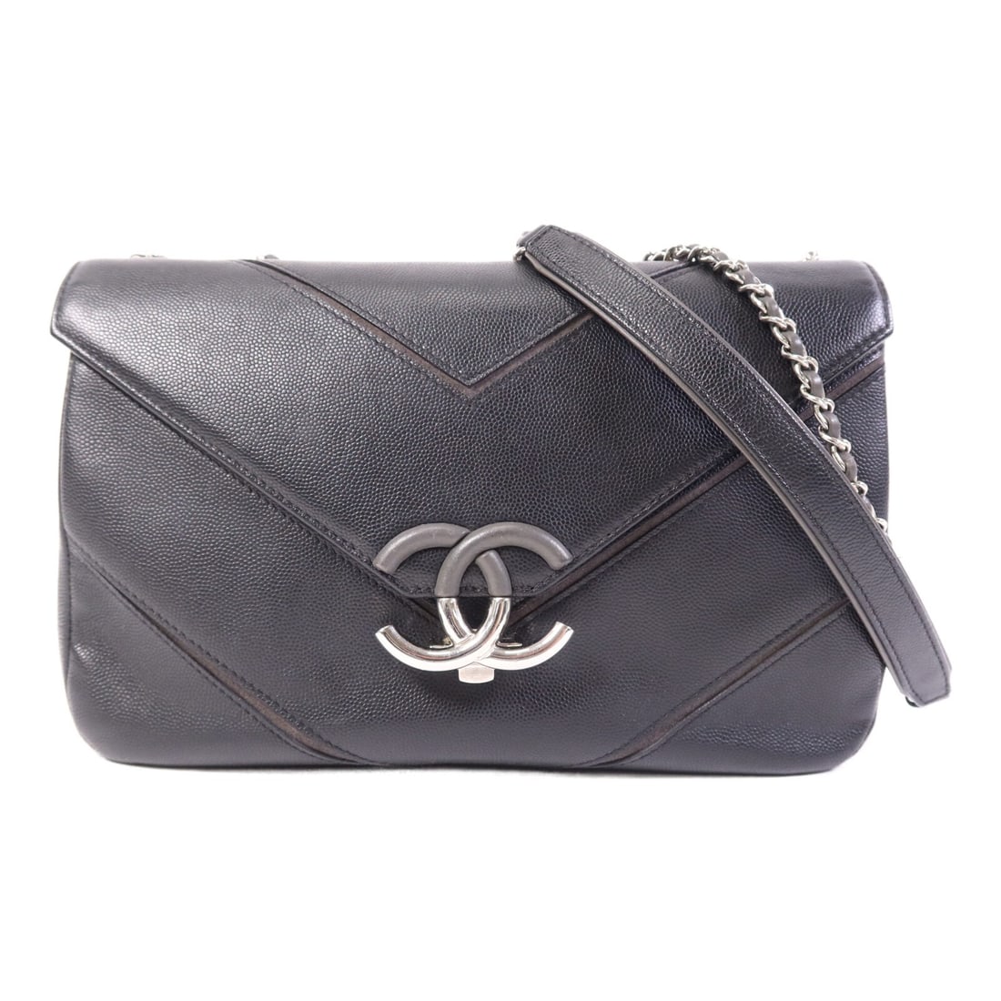 Black Calfskin Leather Shoulder Bag by CHANEL with Silver CC Hardware: Black Calfskin Leather Shoulder Bag by CHANEL with Silver CC Hardware This CHANEL CC shoulder bag is crafted from luxurious black calfskin leather, offering a timeless and sophisticated look. The bag