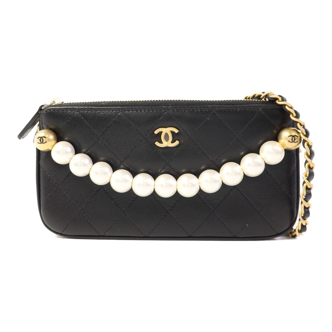 CHANEL Black Calfskin Wallet On Chain Shoulder Bag GHW: CHANEL Black Calfskin Wallet On Chain Shoulder Bag GHW This exquisite CHANEL Wallet On Chain (WOC) is crafted from luxurious black calfskin leather, offering a sophisticated and versatile accessory fo