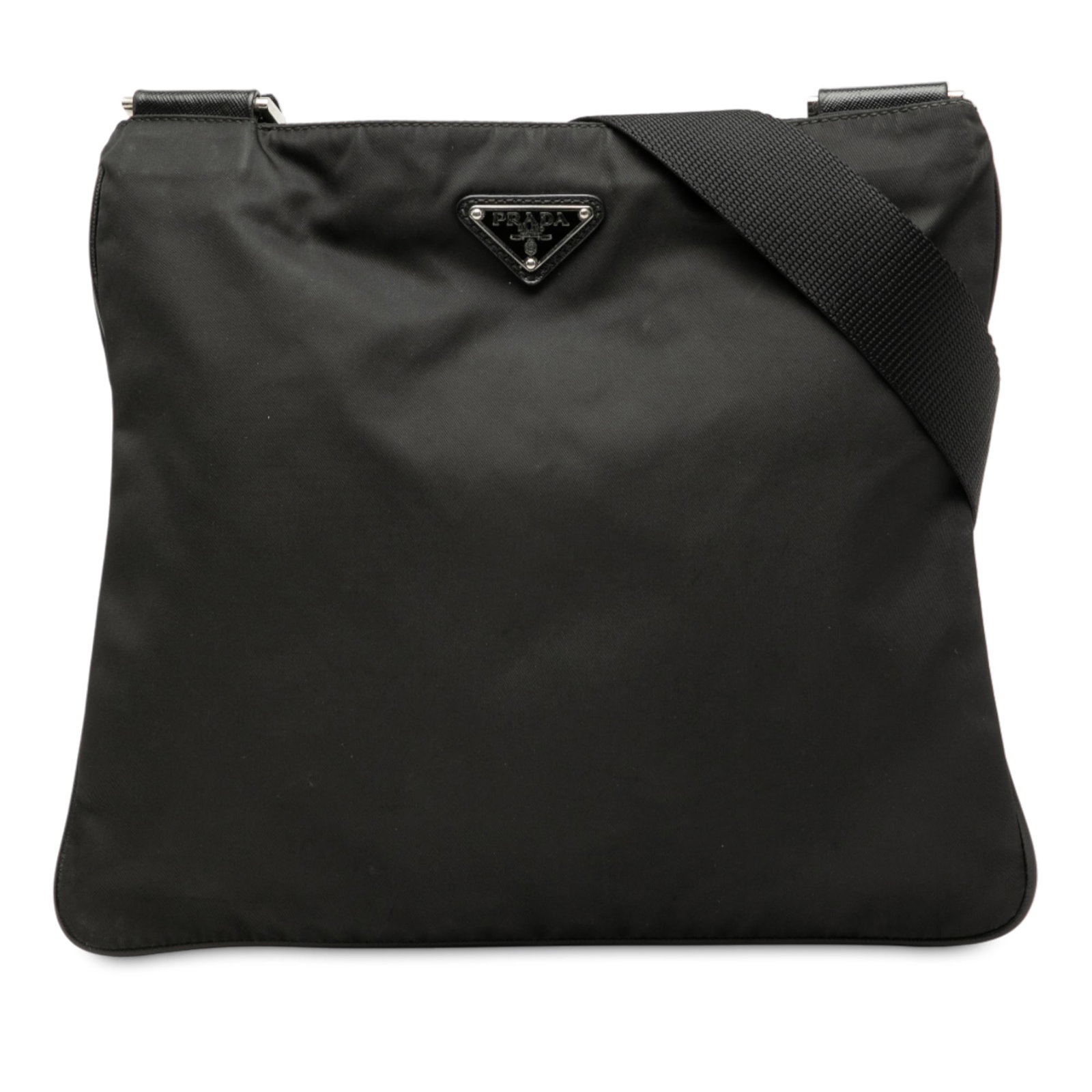 Black Prada Tessuto Nylon Crossbody Bag with Adjustable Strap: Black Prada Tessuto Nylon Crossbody Bag with Adjustable Strap This Prada Tessuto Zip Top Crossbody bag is crafted from durable black nylon fabric and features an adjustable flat shoulder strap for com